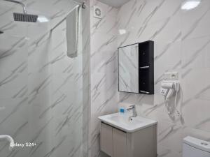 Koupelna v ubytování Hotel Asa