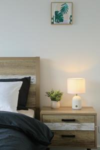 Ένα ή περισσότερα κρεβάτια σε δωμάτιο στο Homelike Townhouse +2 φωτογραφίες