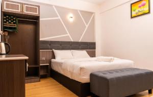 Postel nebo postele na pokoji v ubytování Sunrisestay
