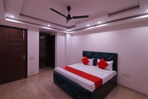 Postel nebo postele na pokoji v ubytování Hotel O Pari Residency