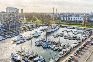 a bunch of boats docked in a harbor at C-Hotels Burlington in Ostend