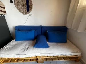 Postel nebo postele na pokoji v ubytování Asia House