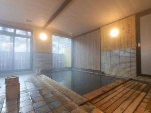 高山市にあるTabist 風雪のスイミングプール付きの空き部屋