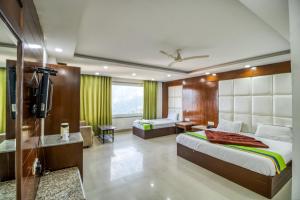 Ένα ή περισσότερα κρεβάτια σε δωμάτιο στο Deep Hotel