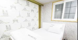 Postel nebo postele na pokoji v ubytování Art motel