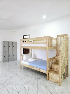 Ένα ή περισσότερα κρεβάτια σε δωμάτιο στο Hello Rafiki House - Stonetown