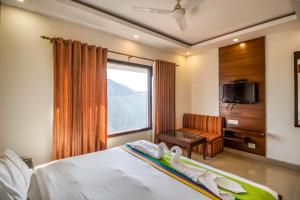 Ένα ή περισσότερα κρεβάτια σε δωμάτιο στο Deep Hotel