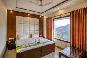 Ένα ή περισσότερα κρεβάτια σε δωμάτιο στο Deep Hotel
