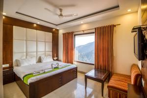Ένα ή περισσότερα κρεβάτια σε δωμάτιο στο Deep Hotel