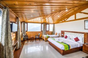 Ένα ή περισσότερα κρεβάτια σε δωμάτιο στο Deep Hotel