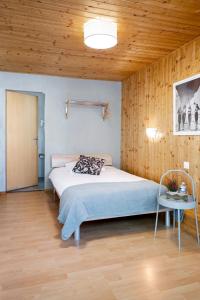 Postel nebo postele na pokoji v ubytování Motel-Restaurant 13 Etoiles