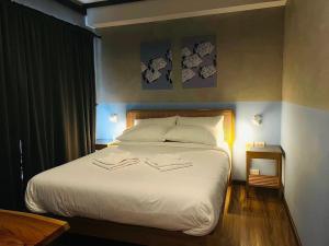 Tali-Yailai Hostel客房内的一张或多张床位