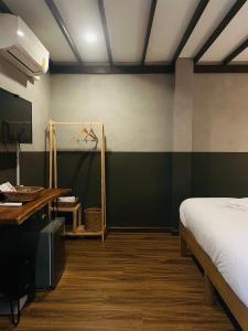 Tali-Yailai Hostel客房内的一张或多张床位
