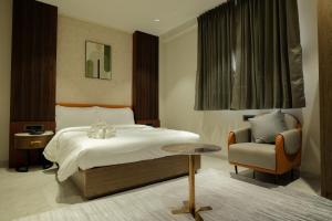 Hotel Aishwarya客房内的一张或多张床位