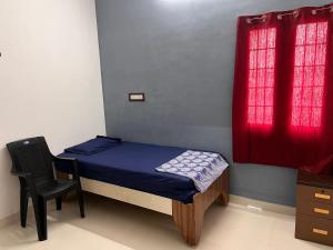 Postel nebo postele na pokoji v ubytování TJ Homestay