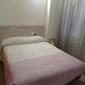 Postel nebo postele na pokoji v ubytování Piso con Encanto