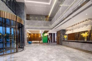 Vstupní hala nebo recepce v ubytování Ramada Encore by Wyndham Chenzhou North