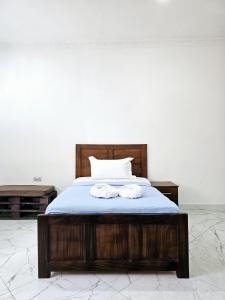 Ένα ή περισσότερα κρεβάτια σε δωμάτιο στο Hello Rafiki House - Stonetown