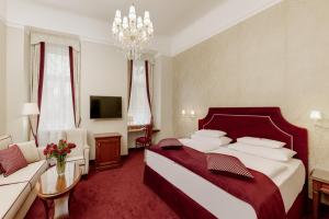 Posteľ alebo postele v izbe v ubytovaní Hotel Stefanie - VIENNA'S OLDEST HOTEL