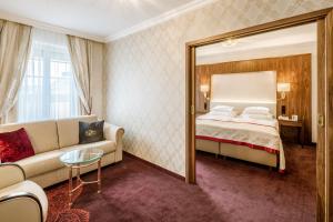 Posteľ alebo postele v izbe v ubytovaní Hotel Stefanie - VIENNA'S OLDEST HOTEL