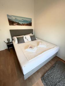 Ένα ή περισσότερα κρεβάτια σε δωμάτιο στο Apartments KANI