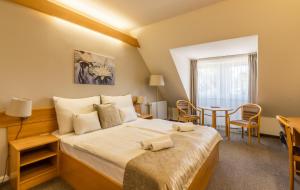 Posteľ alebo postele v izbe v ubytovaní Aqua Hotel Termál