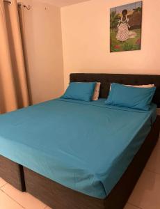 Postel nebo postele na pokoji v ubytování Bula Breeze Lodge