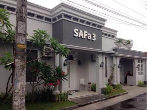 a safac building with a sign on it at Safa Homestay in Yogyakarta