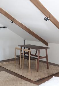 Gambar di galeri bagi charming attic room in general luna di Catagnan