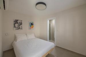 Ένα ή περισσότερα κρεβάτια σε δωμάτιο στο Old City - More apartments