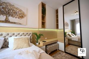 Una cama o camas en una habitación de Luxury hills Zlatibor Spa&Wellness 41 fotos más