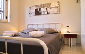Postel nebo postele na pokoji v ubytování Casa Lucia