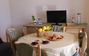 TV a/nebo společenská místnost v ubytování Casa Lucia
