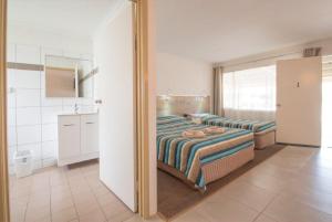 Postel nebo postele na pokoji v ubytování A & A Motel