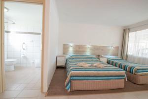 Postel nebo postele na pokoji v ubytování A & A Motel