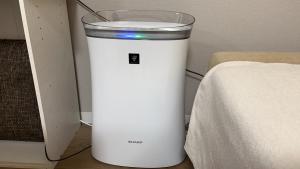a white blender sitting on the floor next to a bed at Newly Renovated 2025 秋リフォーム済 RC206 in Tokyo