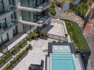 an aerial view of a building with a swimming pool at Aurum 501 and 101 in Cape Town