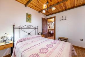 Postel nebo postele na pokoji v ubytování Casa Rural La Jirola -La Vivienda 1