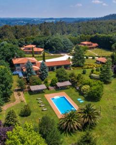 an aerial view of a estate with a swimming pool at HolaCamp Camino in O Pino 