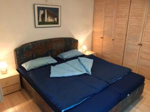 Postel nebo postele na pokoji v ubytování IFAM - Ihr Ferienhaus am Main