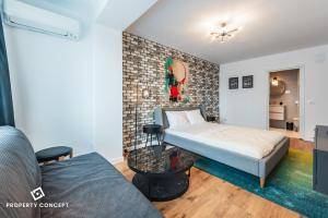 Ένα ή περισσότερα κρεβάτια σε δωμάτιο στο Ivory Concept Studio 52