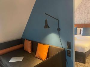 Postel nebo postele na pokoji v ubytování ibis Colmar Centre