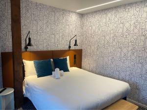 Postel nebo postele na pokoji v ubytování ibis Colmar Centre