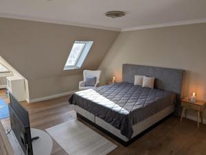 Ένα ή περισσότερα κρεβάτια σε δωμάτιο στο Strandburg-App-14