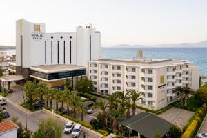 an aerial view of a hotel near the ocean at Boyalik Beach Hotel & Spa Cesme in Çeşme
