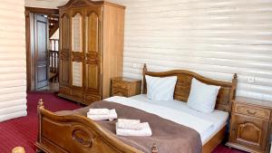 Postel nebo postele na pokoji v ubytování Villa Morishka & SPA