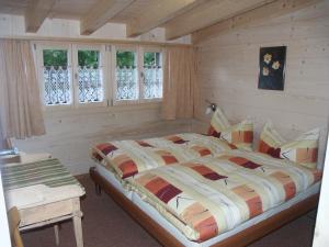 Postel nebo postele na pokoji v ubytování Bietschhorn