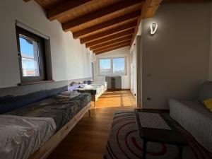 Кровать или кровати в номере Anfite Apartments Villa Sicilia