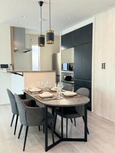 a dining room with a table and chairs at Akikawa Miyoshi 4 in Fukumoto