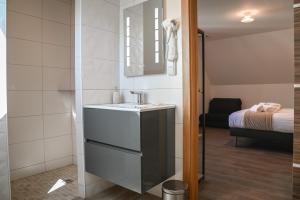 Postel nebo postele na pokoji v ubytování Grande maison de vacances L'Orée des Vignes